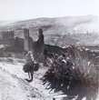 Fès à travers les fumées. Vue prise au pied des Mérinides