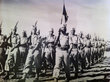 Défilé des vtirailleurs en présence du Général Juin
