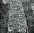 Tombe avec un décor d'arcade